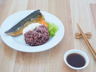 Japanese Food. Mackerel grilled with rice on plate