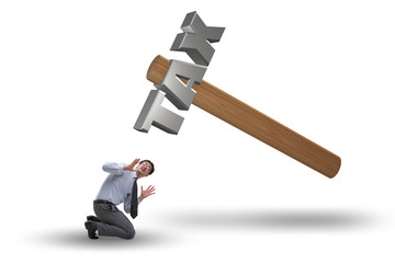 Businessman under the burden of tax payments