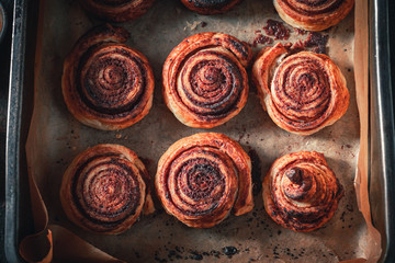 Sweet cinnamon rolls made of puff pastry for Christmas
