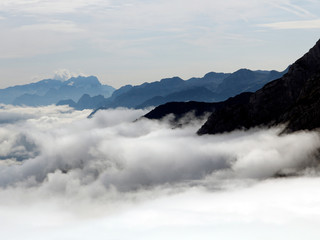 Fototapeta premium Climbing over the clouds in Berchtesgarden, Bavaria Alps