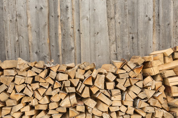 Woodpile - stack of wood. Firewood, sawn trees