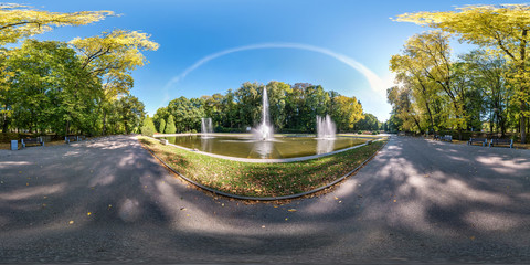 full seamless spherical hdri panorama 360 degrees angle view of early autumn in empty city park...