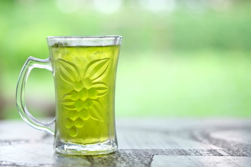 Ice green tea on table.