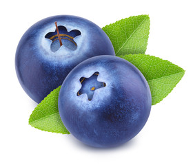 Obraz premium Group of ripe sweet blueberries with leaves isolated on white background.
