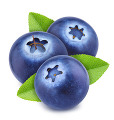 Group of ripe sweet blueberries with leaves isolated on white background.