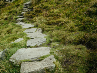 Stone path in a mountains for tourists, Diamond hill, Connemara National park, county Galway,...