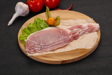 Raw pork bacon