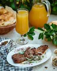 Beef cut served with onion