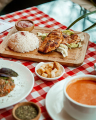 Chicken fillet with rice and ketchup