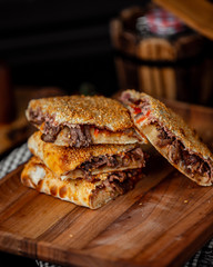 Meat wrap topped with sesame