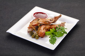 Roasted rabbit legs