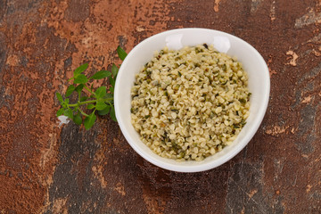 Peeled hemp seeds in the bowl