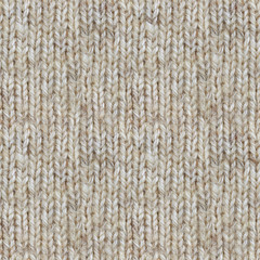 Seamless texture of handmade knitting of natural yarn. Sheep common wool. Knitted background. Closeup