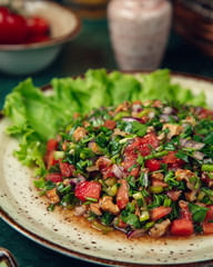 Mixed salad with vegetables and greenery