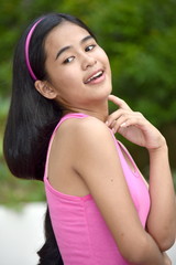 Fototapeta premium An A Smiling Youthful Teen Girl