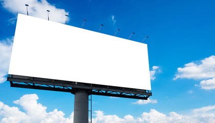 Mockup Large white blank billboard or white promotion poster displayed on the outdoor against the blue sky background. Promotion information for marketing announcements and details