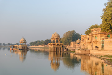 Gadisar lake in the morning. Man-made water reservoir with temples in Jaisalmer. India