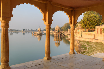 Gadisar lake in the morning. Man-made water reservoir with temples in Jaisalmer. India