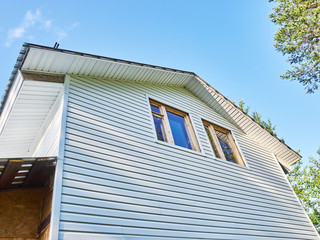 frame house construction. white siding