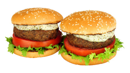 Lamb burger sandwiches with fresh salad and mint yoghurt sauce isolated on a white background