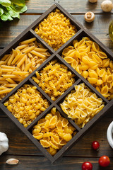 Different types of raw pasta. Italian food. Healthy food background concept.