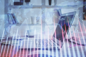 Forex market chart hologram and personal computer background. Double exposure. Concept of investment.