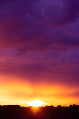 Beautiful pink and orange sunset over the city; nature background