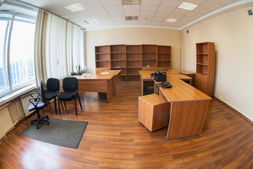 Vacant office or abandoned office space with no people, wide angle view