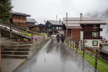 Beautiful scene of walkway and wooden houses in Murren a small town in rural area of Switzerland for background