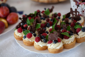 tartlets with quark filling and berries