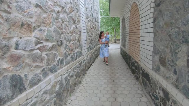Mom with her son on nature