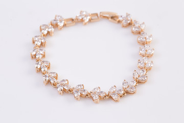 Golden Bracelet with diamonds.