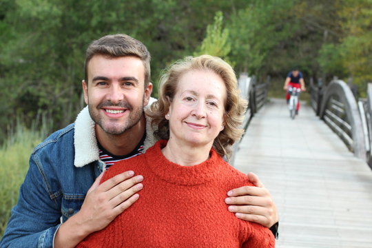 Mother And Son Smiling Outdoors 