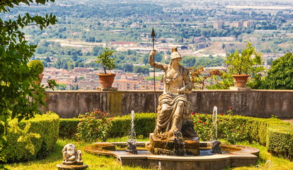 Ancient fountain decorated with  statue of  ancient goddess Athena