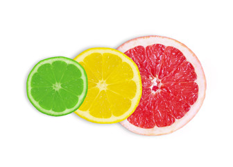Fresh slices of grapefruit, lemon and lime on a white background.Isolate