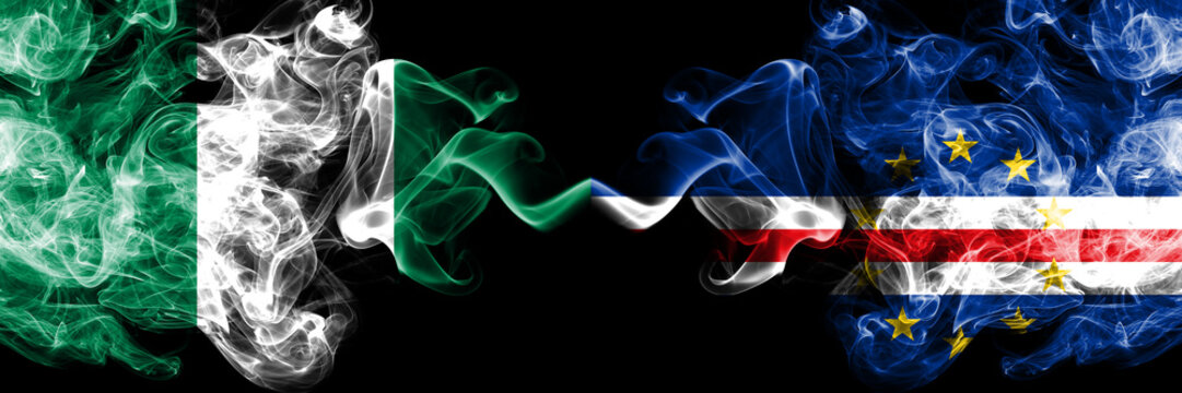 Nigeria vs Cape Verde abstract smoky mystic flags placed side by side. Thick colored silky smoke flags of Nigerian and Cape Verde