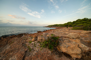 Sunrise between rocks and the Oropesa Sea