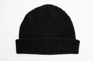 black wool beanie isolated for wintertime on white background