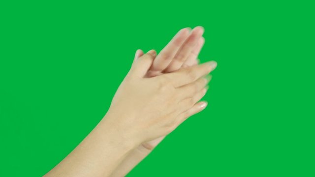 4K. woman hands slow clapping, applause isolated on chroma key green screen