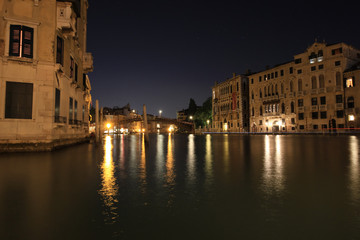 The nighttime beauty of Venice and the lights of the city. Italy.