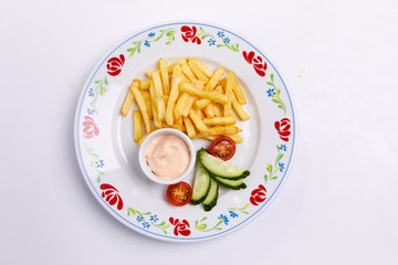 french fries with sauce on the white