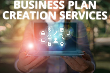 Writing note showing Business Plan Creation Services. Business concept for paying for professional to create strategy