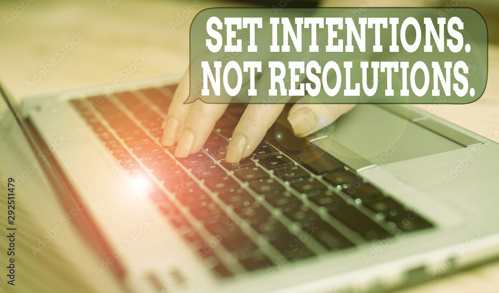 Poster writing note showing set intentions not resolutions. business concept for positive choices for new s