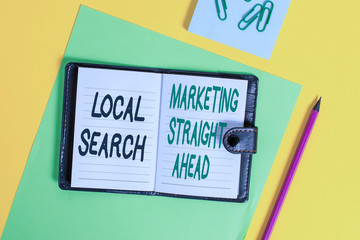 Conceptual hand writing showing Local Search Marketing Straight Ahead. Concept meaning answering to someone about destination Locked diary striped sheets clips notepad colored background