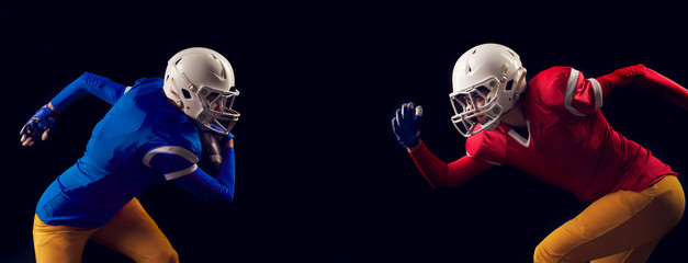 Photo of two running women American football player on black background