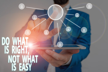 Word writing text Do What Is Right Not What Is Easy. Business photo showcasing Make correct actions Have integrity Male human wear formal work suit presenting presentation using smart device