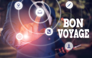 Obraz premium Writing note showing Bon Voyage. Business concept for used express good wishes to someone about set off on journey