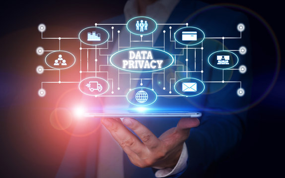 Conceptual hand writing showing Data Privacy. Concept meaning protection of sensitive data from unrelated third parties Male wear formal suit presenting presentation smart device