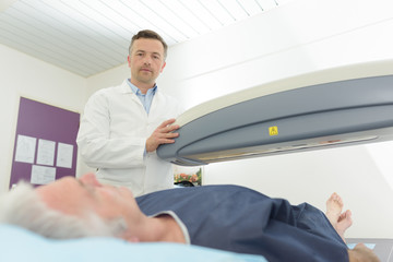 senior patient undergoing mri scan at hospital