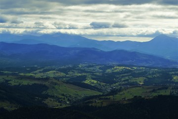  view of the mountain range in the clouds